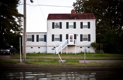 In Norfolk, Virginia, some residents are starting to raise their houses to counteract sea-level rise. (Photo/Morgan Heim)
